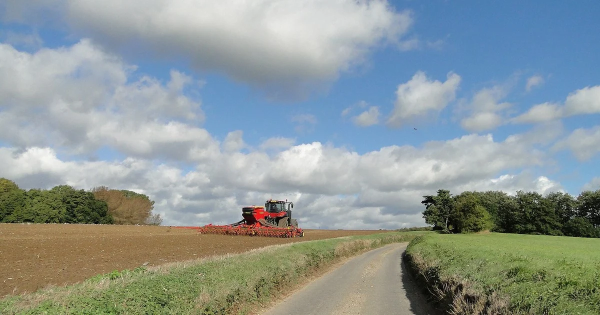Tractor cultivating the soil ready for drilling (2)